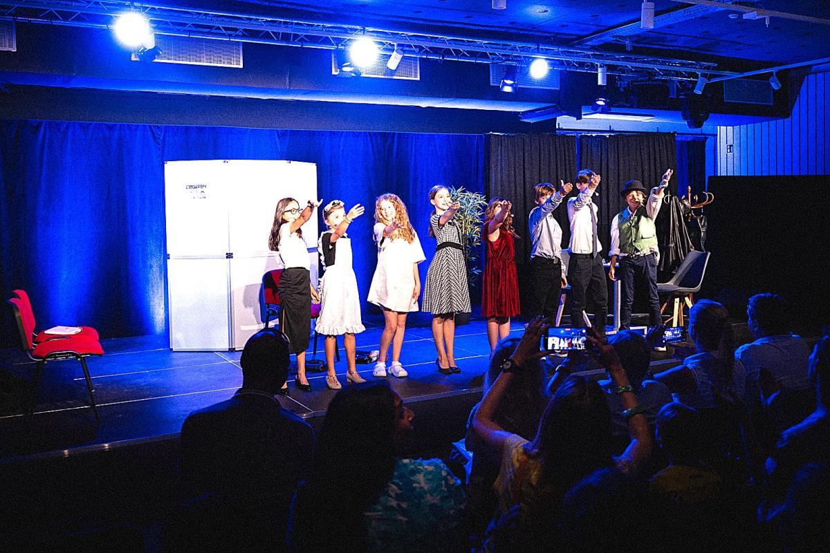 The theatre company taking their bow at the end of the show, at the Ateliers de la Côte in Etoy